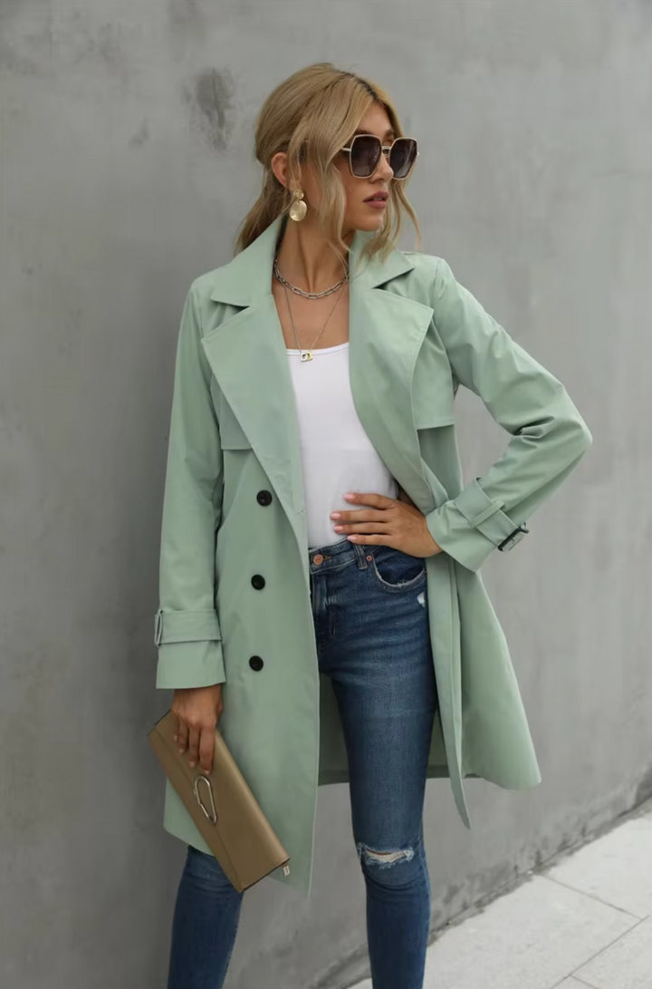Elegant women's double-breasted trench coat in khaki, featuring a chic belt. Perfect outerwear.