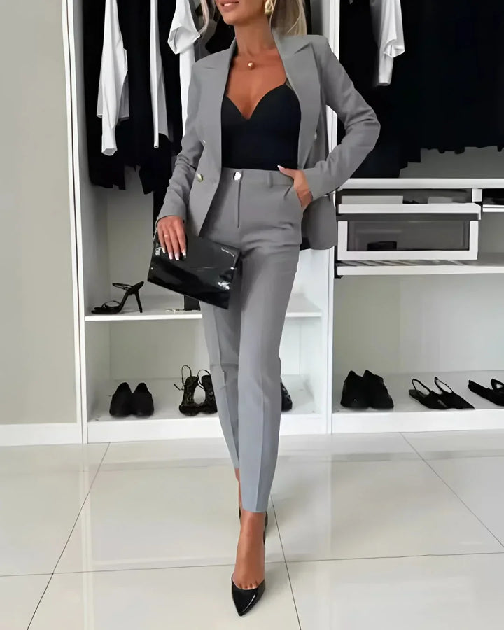 Double-breasted women's tailored blazer & trousers set for a sophisticated and sharp office outfit.