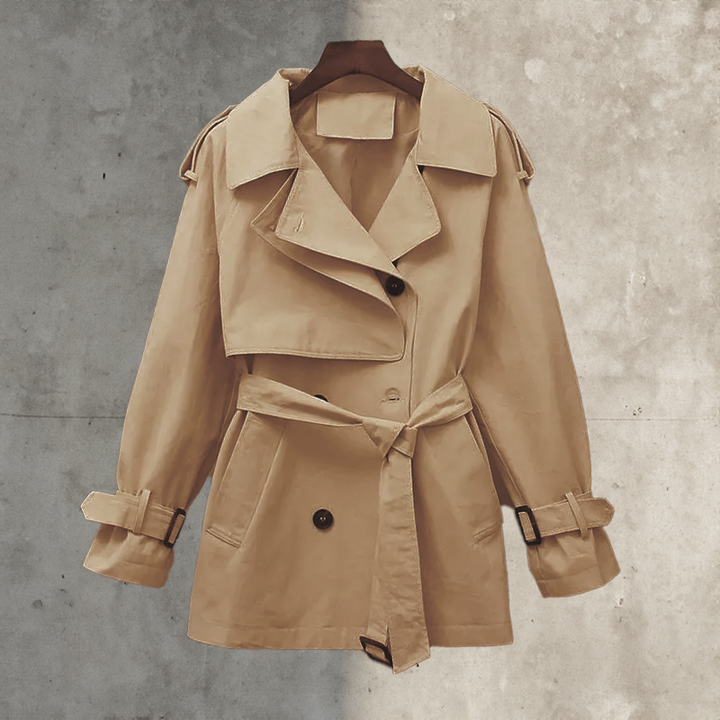 Elegant women's belted trench coat. Versatile double-breasted long jacket, perfect for fall fashion & workwear.