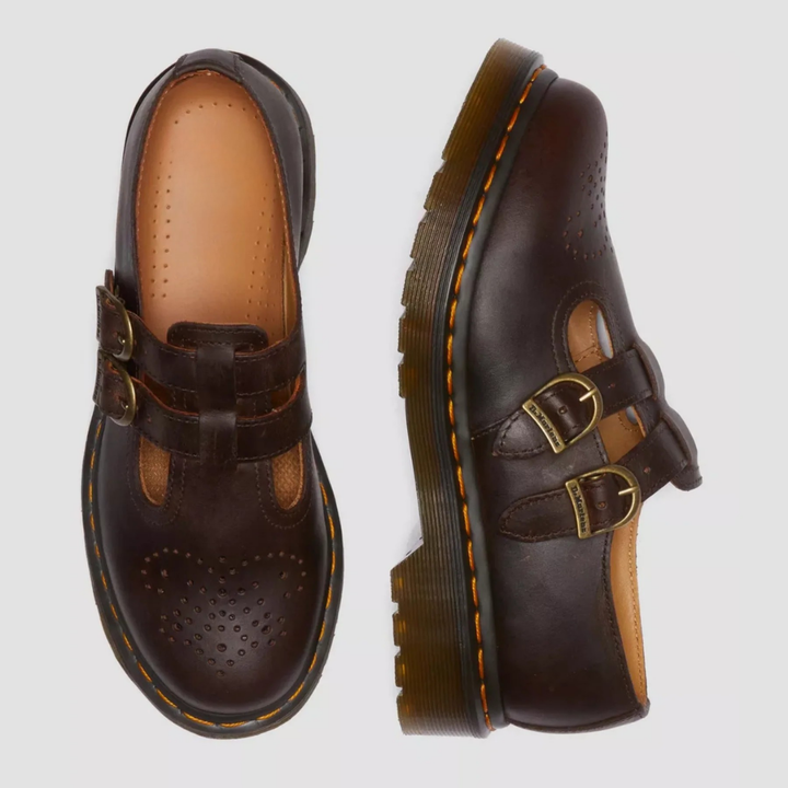 Edgy black women's double buckle Mary Jane flats, comfortable and stylish everyday footwear.
