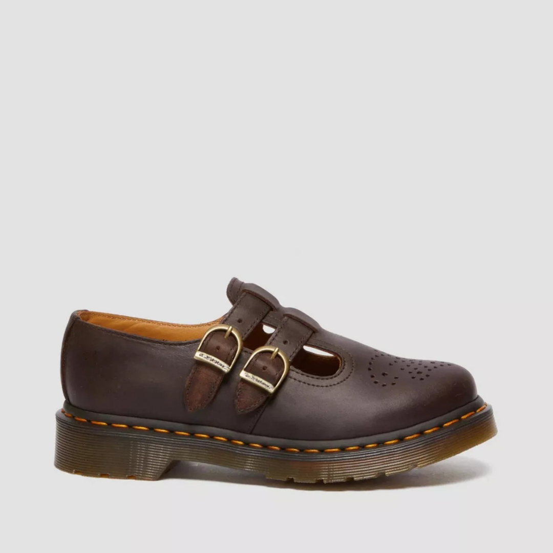 Pair of women's double buckle Mary Jane flats, showcasing edgy design for comfortable, stylish wear.