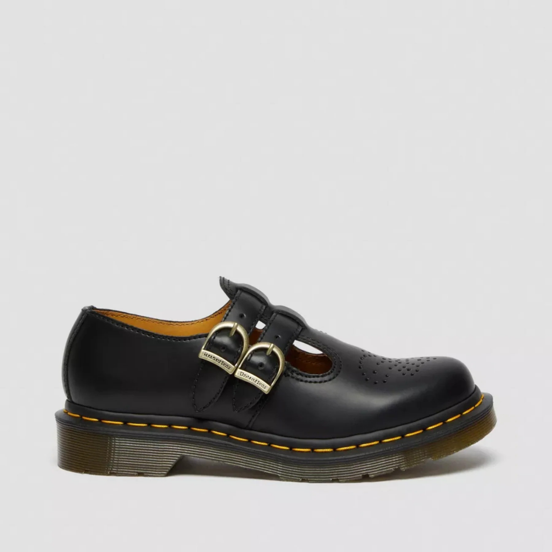 Close-up of black women's double buckle Mary Jane flats, showcasing edgy details and comfort.