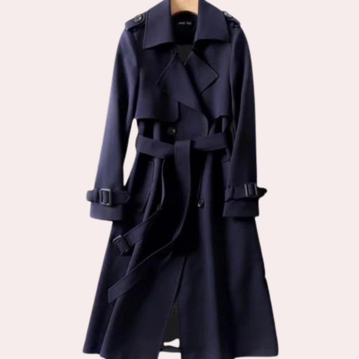 Classic double button tailored long coat for women, elegant design. Versatile fall outerwear for a refined business look.