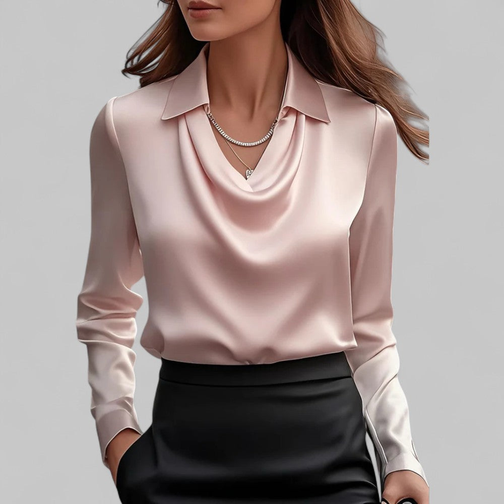 Close-up of a women's draped neck satin blouse, showcasing fabric texture and long sleeve design