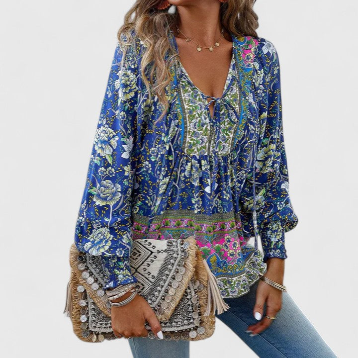 Versatile women's floral long sleeve blouse, offering a comfortable boho peasant style.
