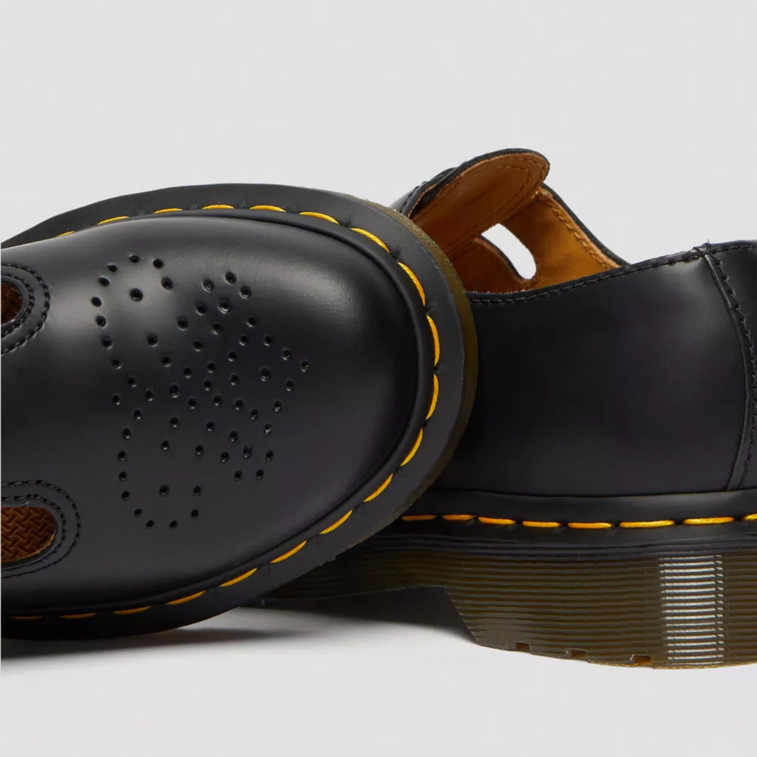 Statement footwear: unique women's double buckle Mary Jane flats for edgy grunge fashion.