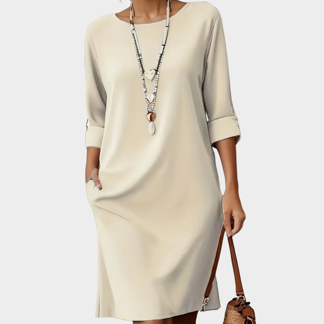 Comfortable women's shift dress, ideal for all-day wear. Effortless fashion with a flattering fit and three-quarter sleeves.