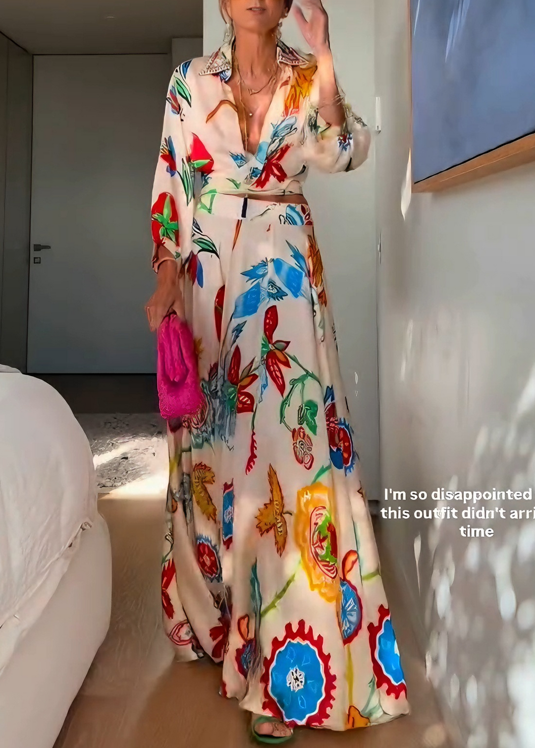 Full view of women's beige floral maxi skirt, paired with a matching tie-front top for a summer look.