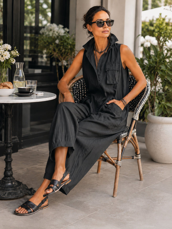 Stylish black wide leg jumpsuit for women with a classic collar and sleeveless cut, ideal for casual elegance.