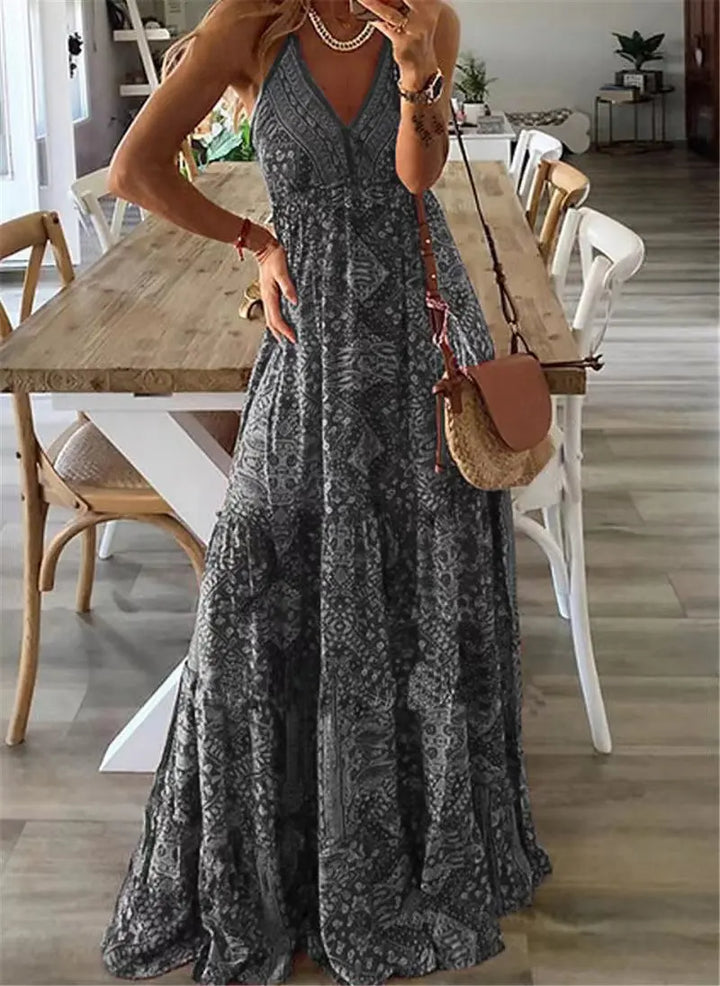 Elegant women's floral print boho maxi dress. Ideal summer fashion for parties, beach, or casual comfortable wear.