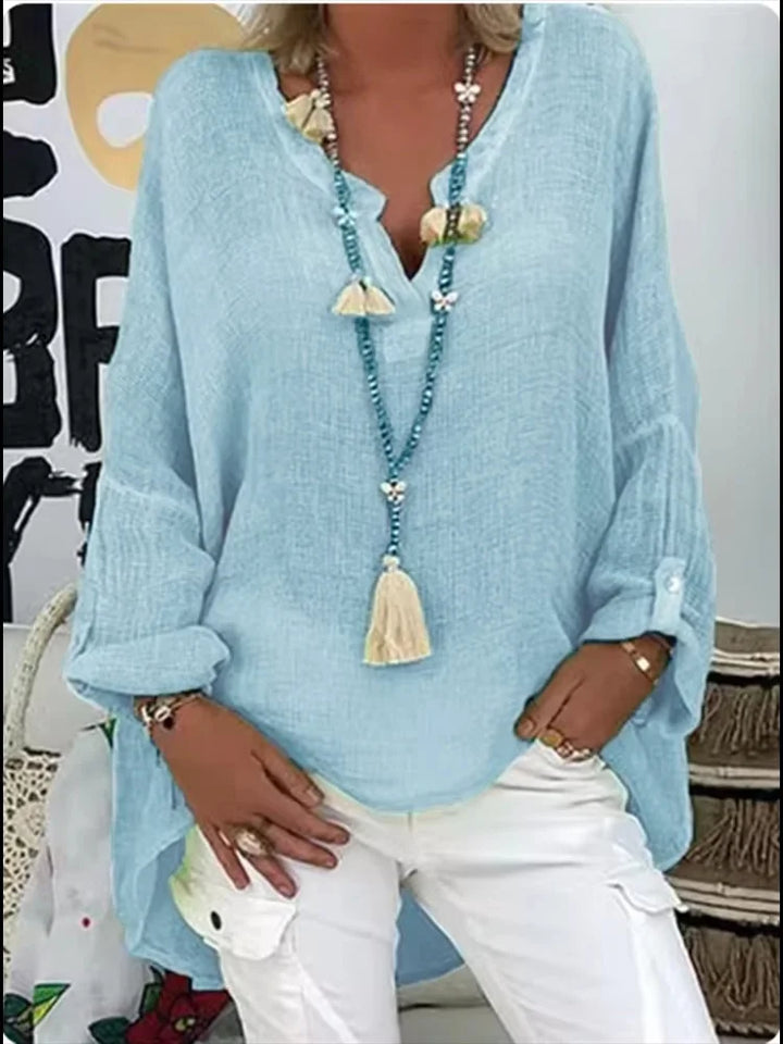 Women's Effortless Chic Oversized Blouse, a relaxed fit top perfect for contemporary summer style.