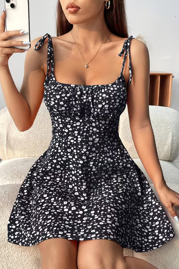 Women's effortless floral strapless slip dress, perfect for summer vacations & casual elegance. Chic mini design.