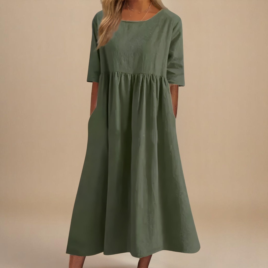 Women's effortless gathered waist midi dress with half sleeves & scoop neck, perfect for casual summer wear.