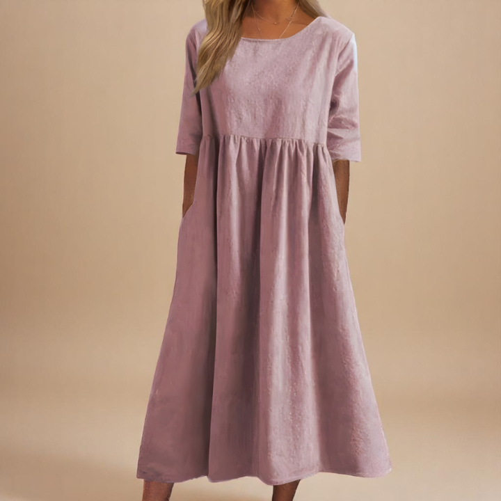 Women's casual midi dress with half sleeves, a gathered waist, scoop neck. Perfect everyday summer dress.