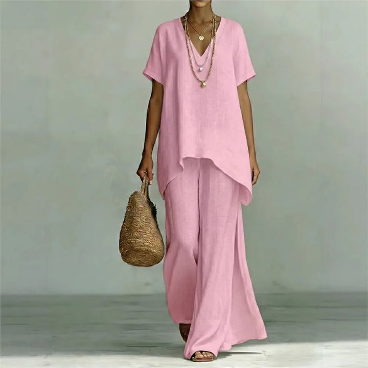 Relaxed fit wide-leg linen blend two-piece set with asymmetrical pullover top.