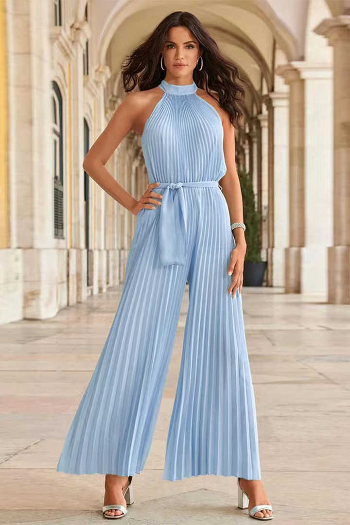 Versatile women's pleated jumpsuit, a chic travel outfit for comfortable fashion and modern style.