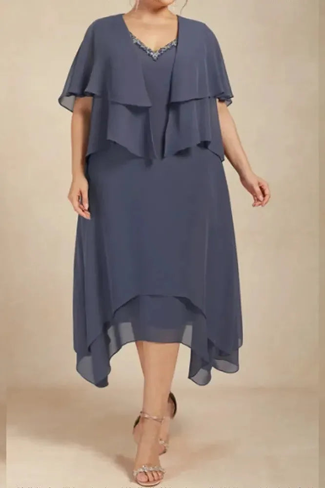Women's effortless printed flowy midi dress for summer. Elegant & comfortable casual daywear with a relaxed fit.