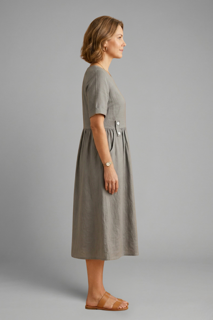 Comfortable and elegant women's midi dress, featuring a round neck & loose fit for relaxed style.