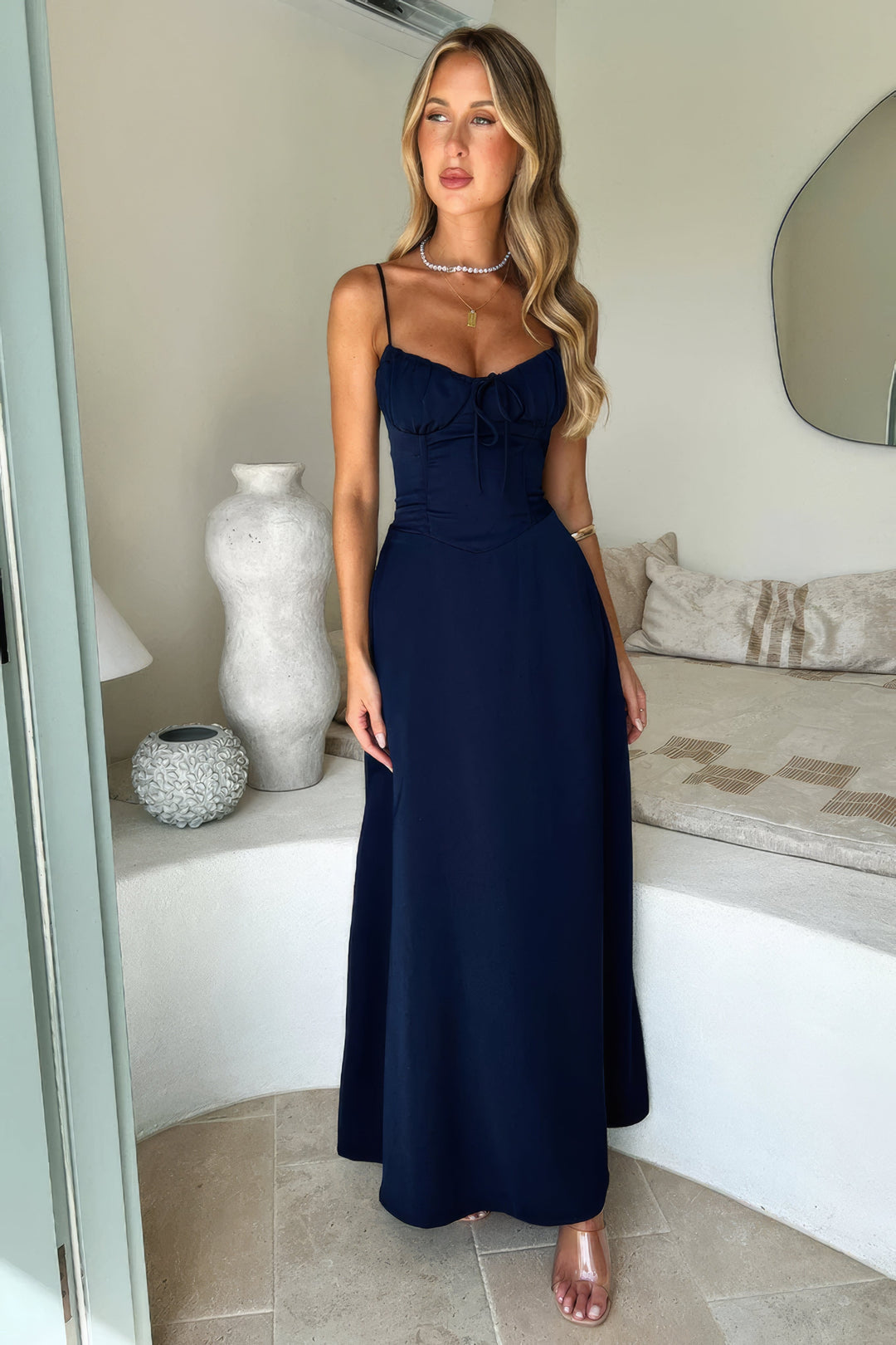 Elegant sleeveless maxi dress, A-line cut, ideal for resort wear or summer events.