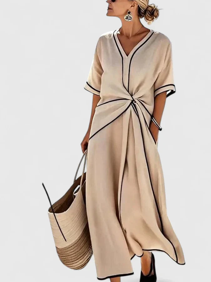 Women's effortless striped midi dress for summer comfort. Chic, breathable, and versatile warm weather fashion.