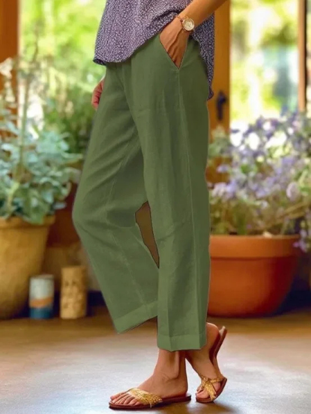 Versatile women's tapered cropped pants with cuffed hem, effortless smart casual summer style. Comfortable & modern.