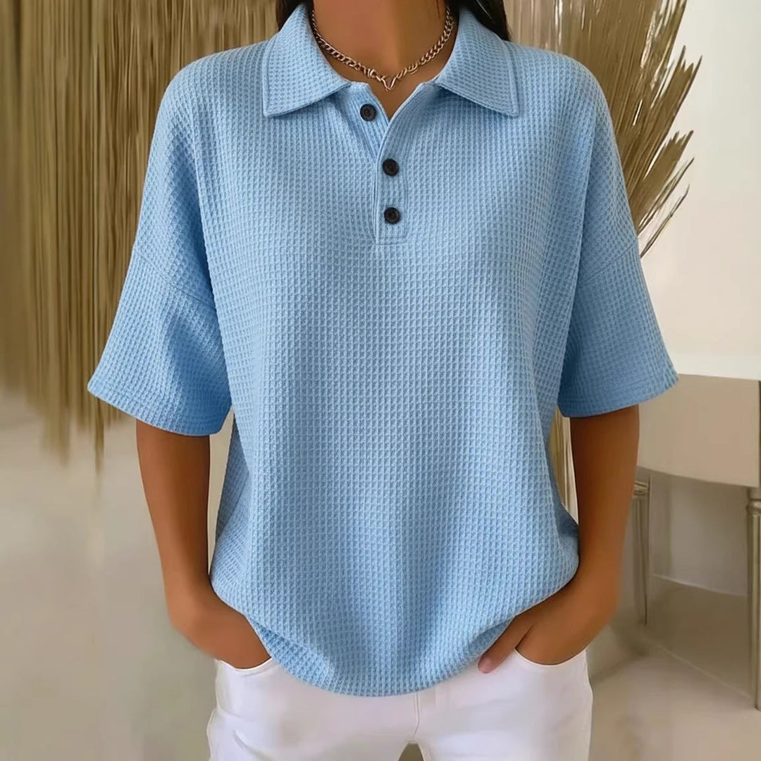 Effortless women's summer polo blouse, waffle knit fabric, short sleeve, loose fit for ultimate comfort.