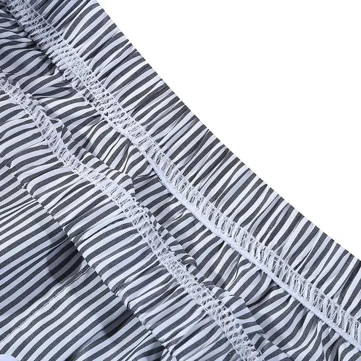 Elastic waist shirt extender for women, great for office style and fashionable layering.