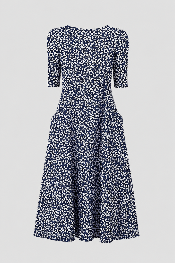 Stylish women's A-line occasion wear midi dress. Features short sleeves & elegant silhouette.