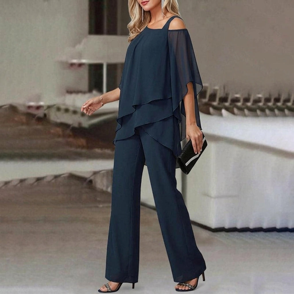 Elegant women's two-piece set with an asymmetric top & straight leg pants, offering versatile modern style.