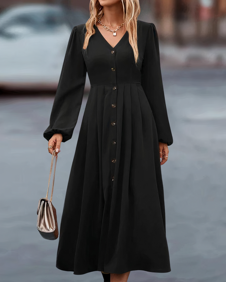 Women's long sleeve autumn maxi dress with elegant button-front design and V-neck, a versatile fall outfit.