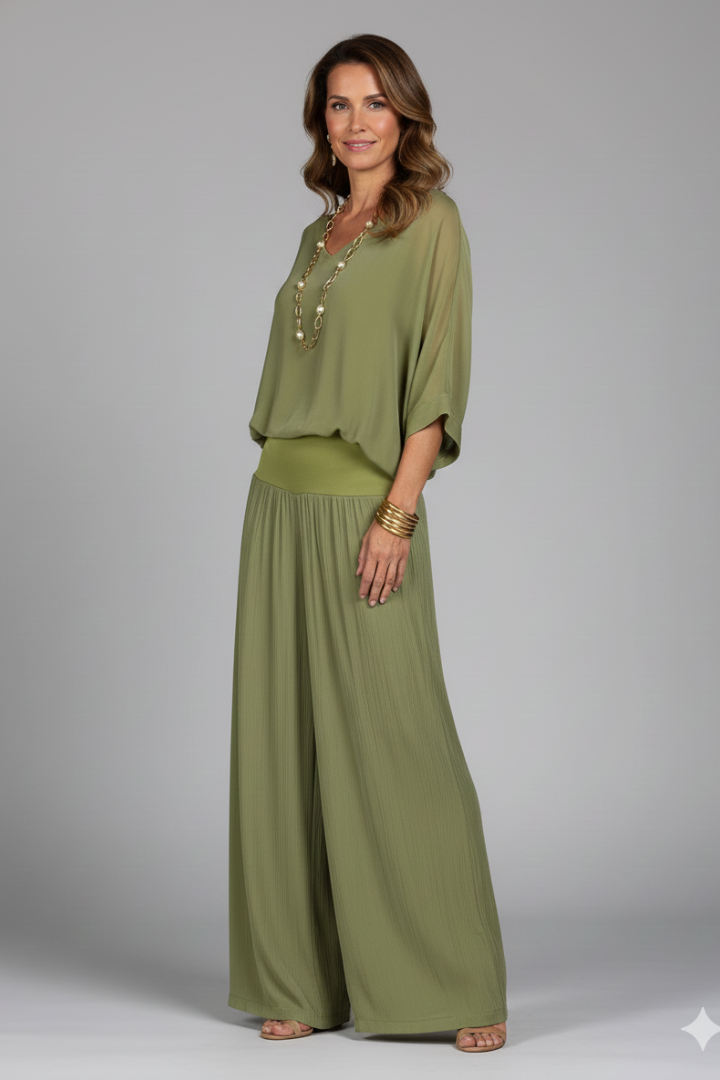 Comfortable yet elegant women's two-piece set: batwing top & wide leg pants. Versatile for any event.