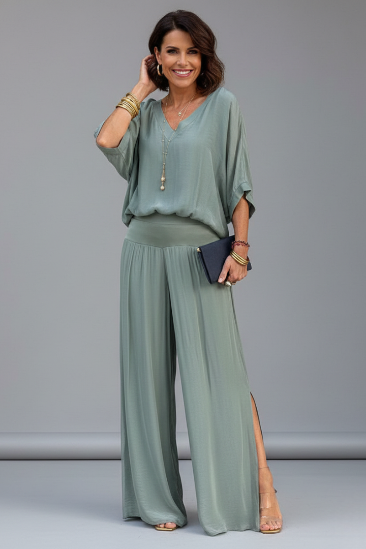 Sophisticated women's batwing top & wide leg pant set, offering an elegant look for parties & summer fashion.