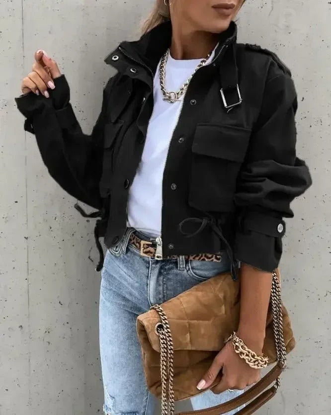 Women's elegant black cropped summer jacket, perfect for workwear or casual chic. Lightweight & stylish modern outerwear.