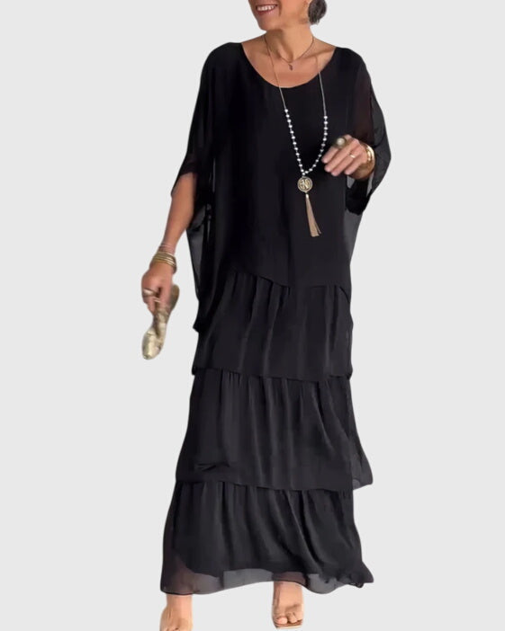 Elegant women's button-front maxi dress, perfect for wedding guest attire.