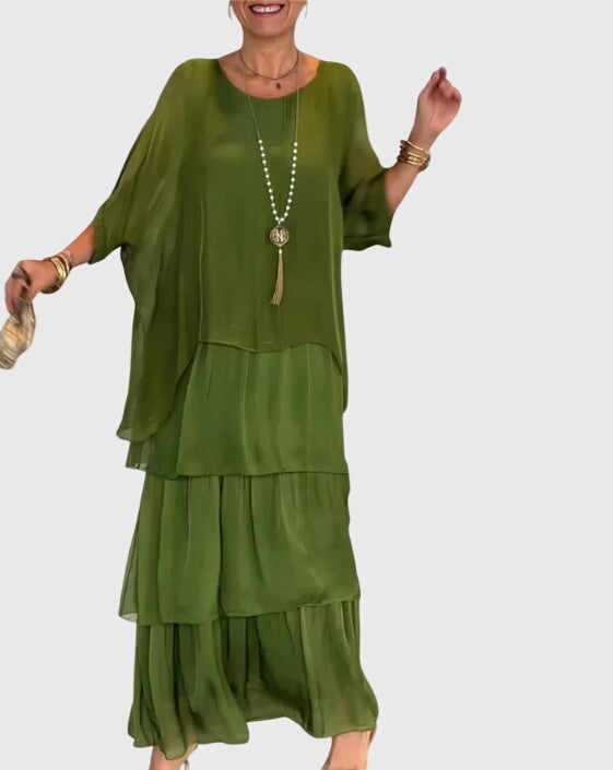 Stylish button-up formal long dress, perfect for elegant wedding guest attire.