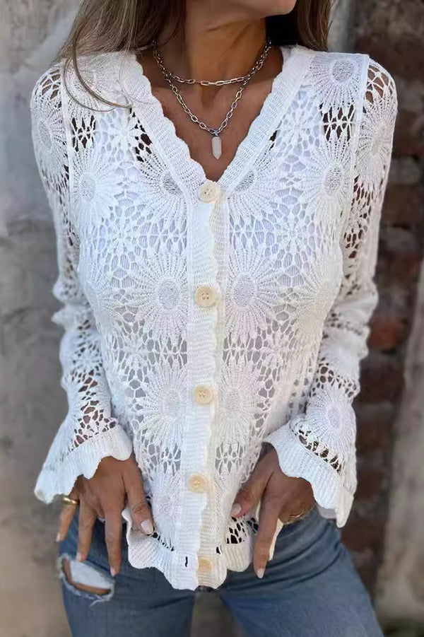 Women's elegant crochet cardigan with button front, V-neck, and long sleeves. Versatile knitwear for layering.