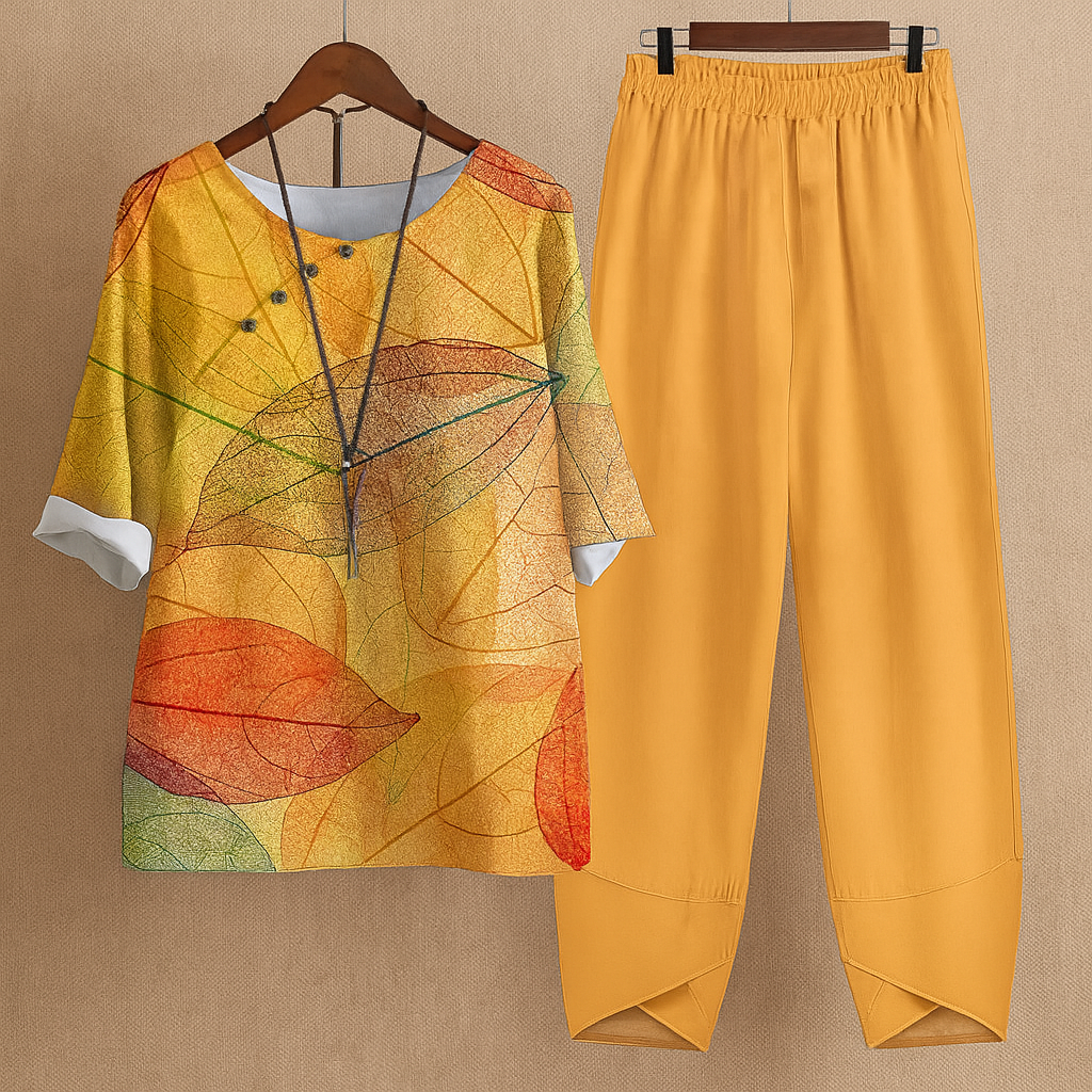 Women's elegant floral 2-piece set with loose fit top & harem pants, ideal for summer comfort & style.
