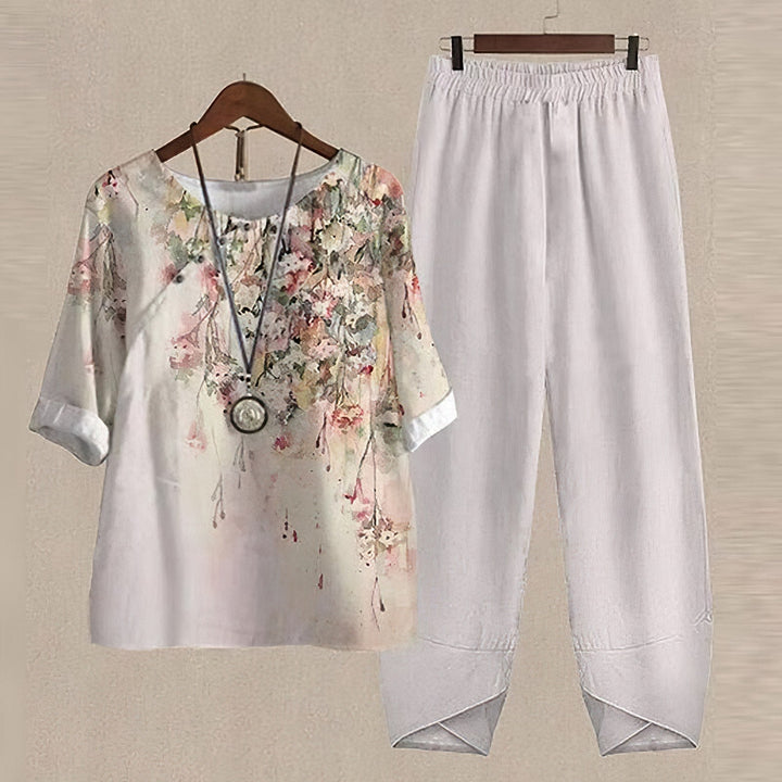 Elegant women's floral print 2-piece set, perfect for comfortable & stylish summer fashion.