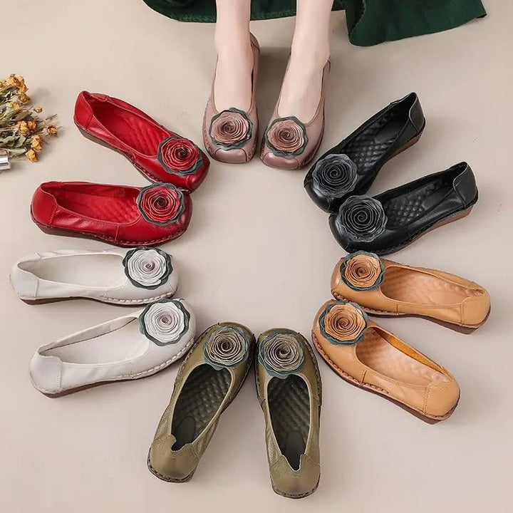 Women's comfortable slip-on loafers with elegant floral appliqué, ideal for summer.