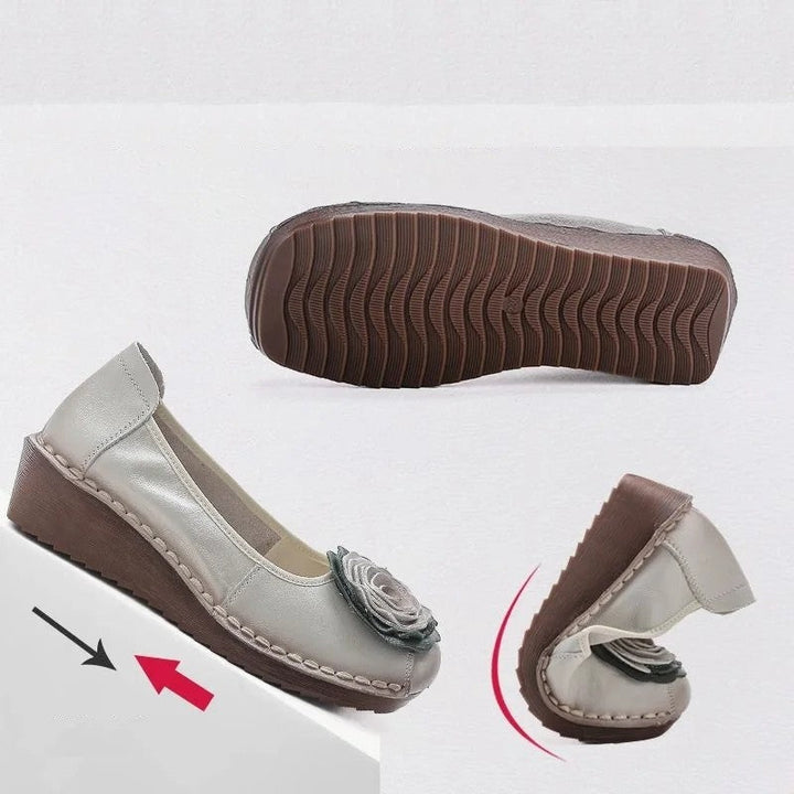Women's casual loafers, featuring a lovely floral appliqué and easy slip-on style.