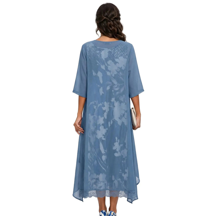 Chic women's two-piece floral long dress & cardigan set. Ideal for versatile spring & summer fashion.