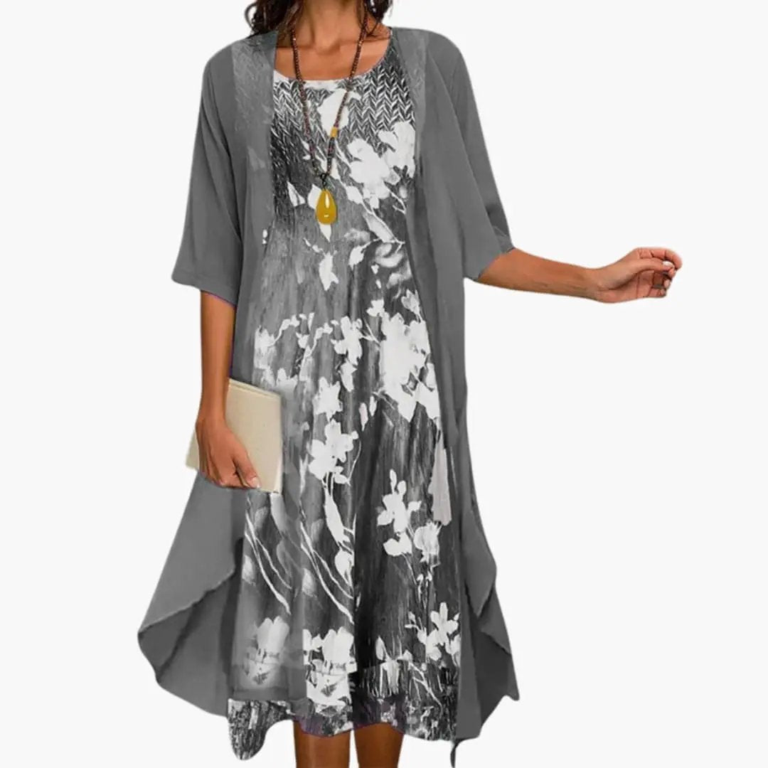 Women's casual yet elegant floral print maxi dress with a light cardigan. Perfect for warm weather.
