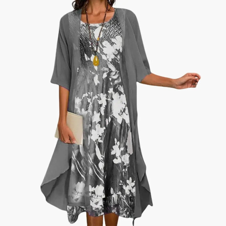 Women's casual yet elegant floral print maxi dress with a light cardigan. Perfect for warm weather.