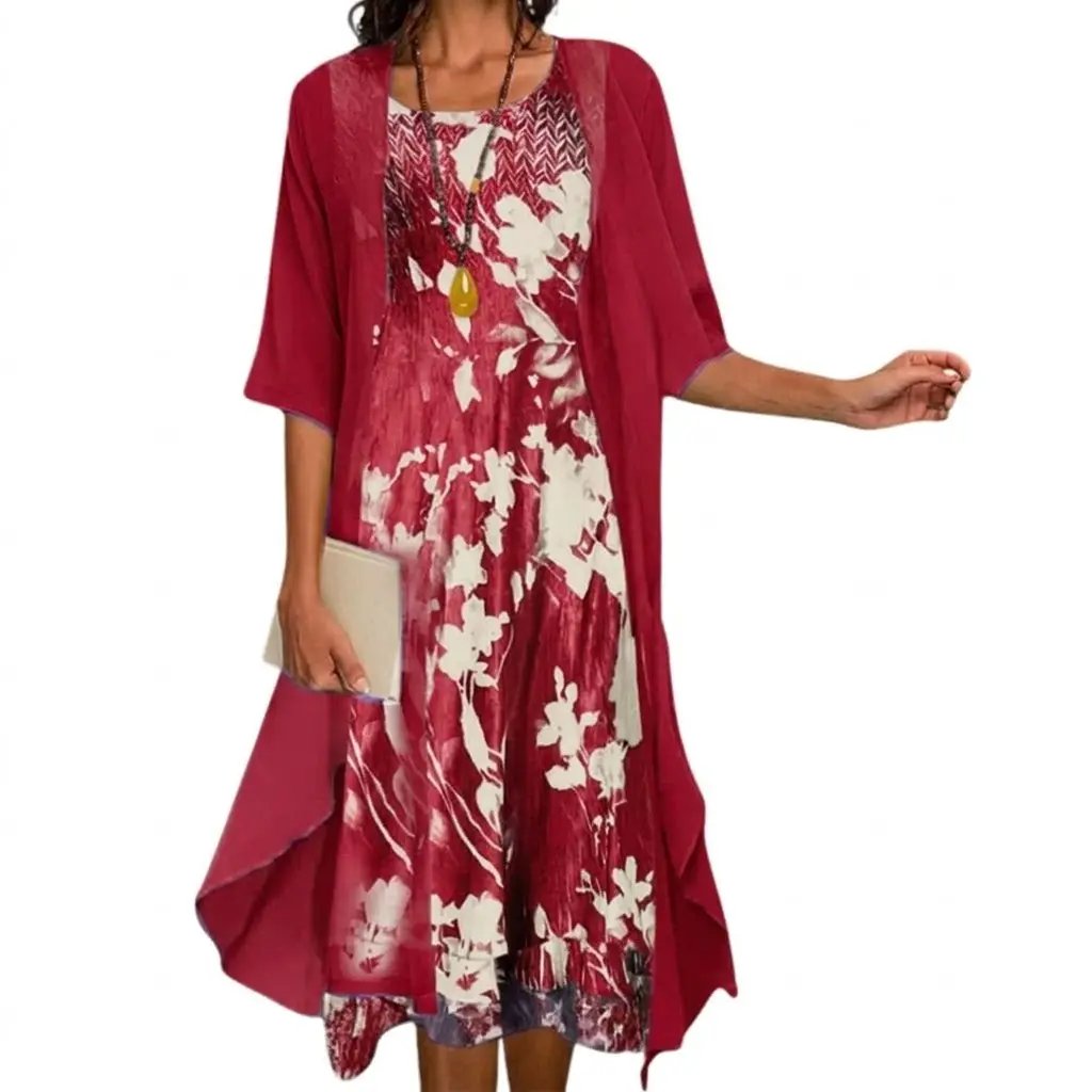 Delicate women's floral maxi dress and complementary cardigan set. Achieve a graceful layered look.