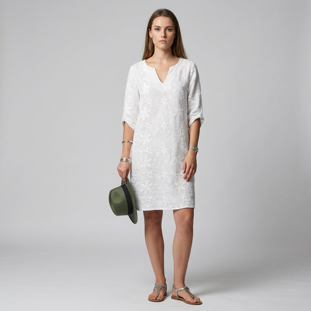 Women's elegant floral midi dress with V-neck and half sleeves, perfect for summer casual and special occasions.