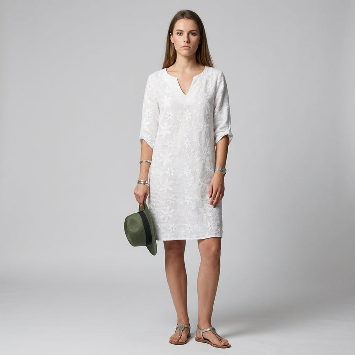 Women's elegant floral midi dress with V-neck and half sleeves, perfect for summer casual and special occasions.
