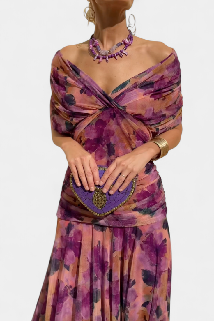 Women's floral off-shoulder maxi dress, long sleeves, elegant and flowy for special events.