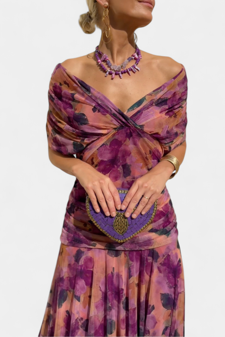 Women's elegant off-shoulder floral print maxi dress with long sleeves, ideal for ceremonies.