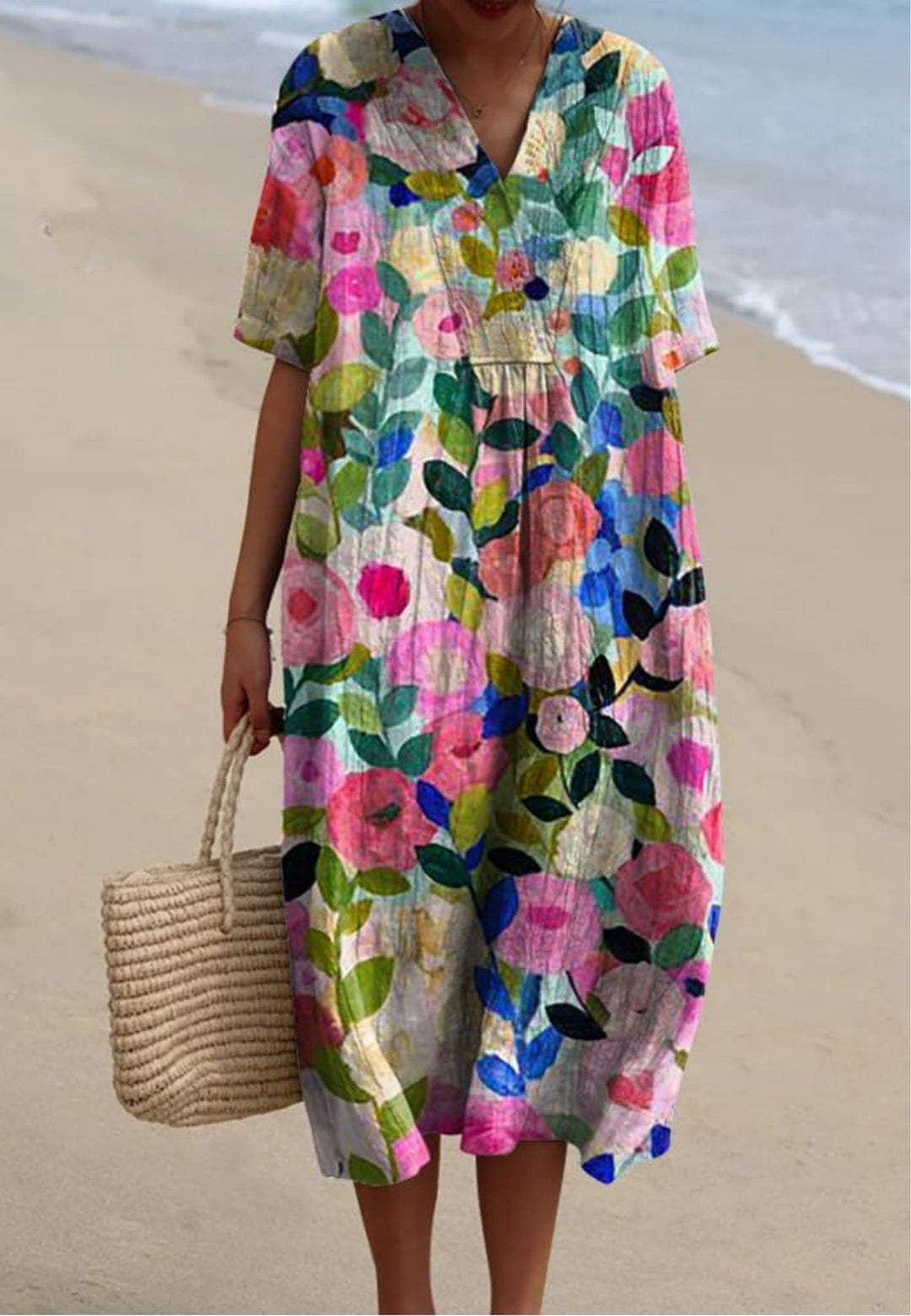 Women's elegant floral V-neck short sleeve oversized midi dress for casual summer wear or vacation. Comfortable and stylish.