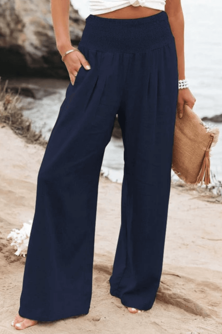 Elegant boho palazzo pants, women's flowy wide-leg. Comfortable high-waist for summer casual & beach.